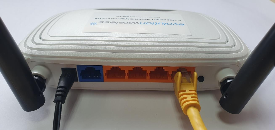 Router back: yellow cable into orange port